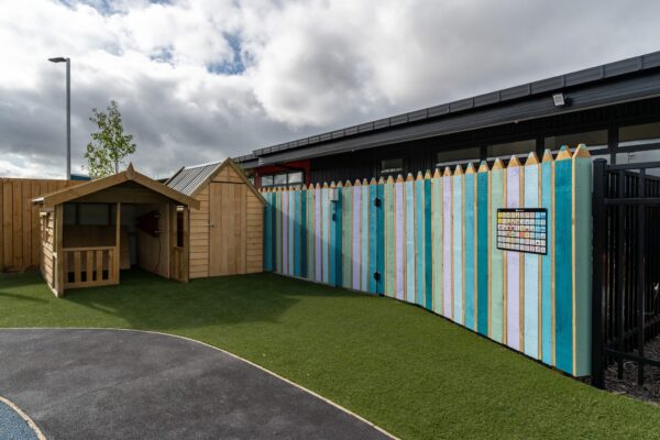 architecturally designed wooden fence panels in the style of pencils installed by Axiom Built at Pītau-Allenvale School in Belfast, Christchurch