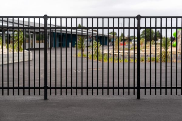 Black steel fencing for Pītau-Allenvale School in Belfast, Christchurch designed, manufactured and installed by Axiom Built