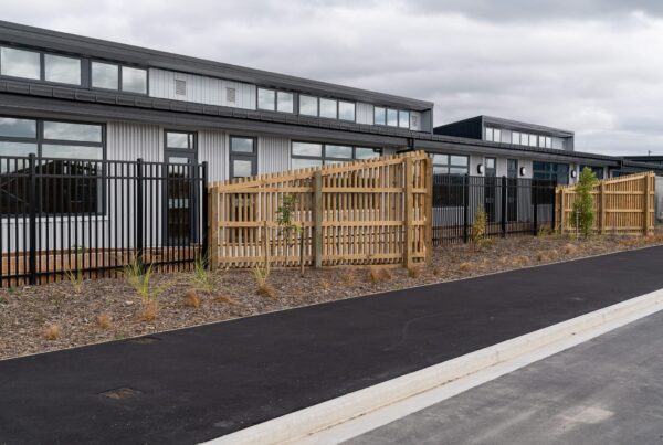 image of architectural timber school fencing designed and installed by Axiom Built at Pītau-Allenvale School in Belfast, Christchurch