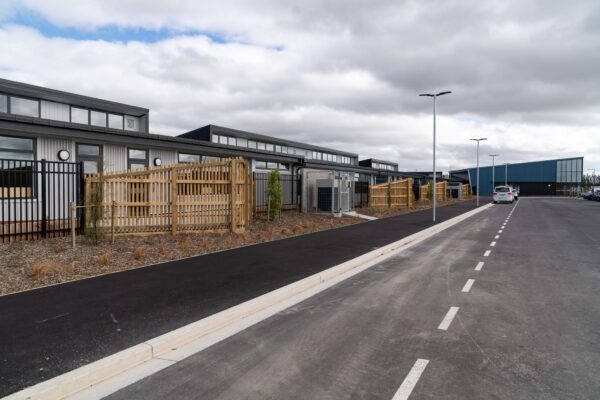 image of architectural timber school fencing designed and installed by Axiom Built at Pītau-Allenvale School in Belfast, Christchurch