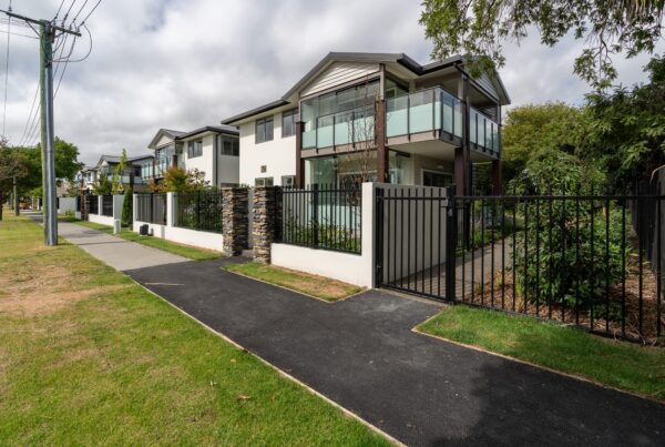 street-view image of black metal balustrade fencing and metal security gate designed and installed by Axiom Built for Oceania Healthcare facility in Christchurch