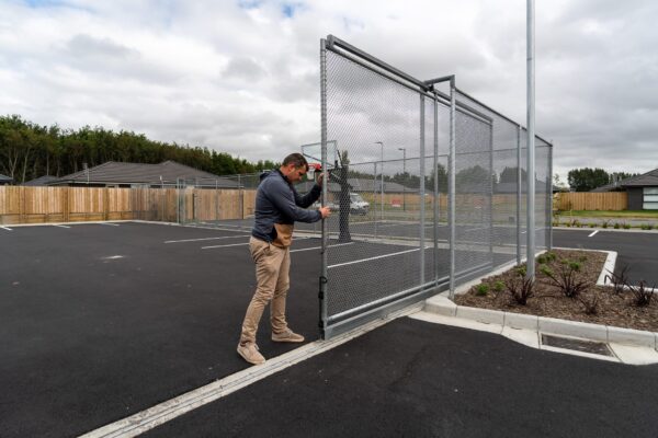 custom sliding chainlink gate installed by Axiom Built for extra security at Pītau-Allenvale School in Belfast, Christchurch