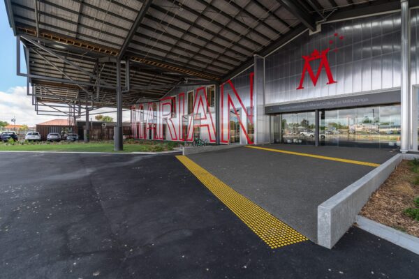 image of Marian College entrance featuring new wooden boundary fencing installed by Axiom Built in Christchurch