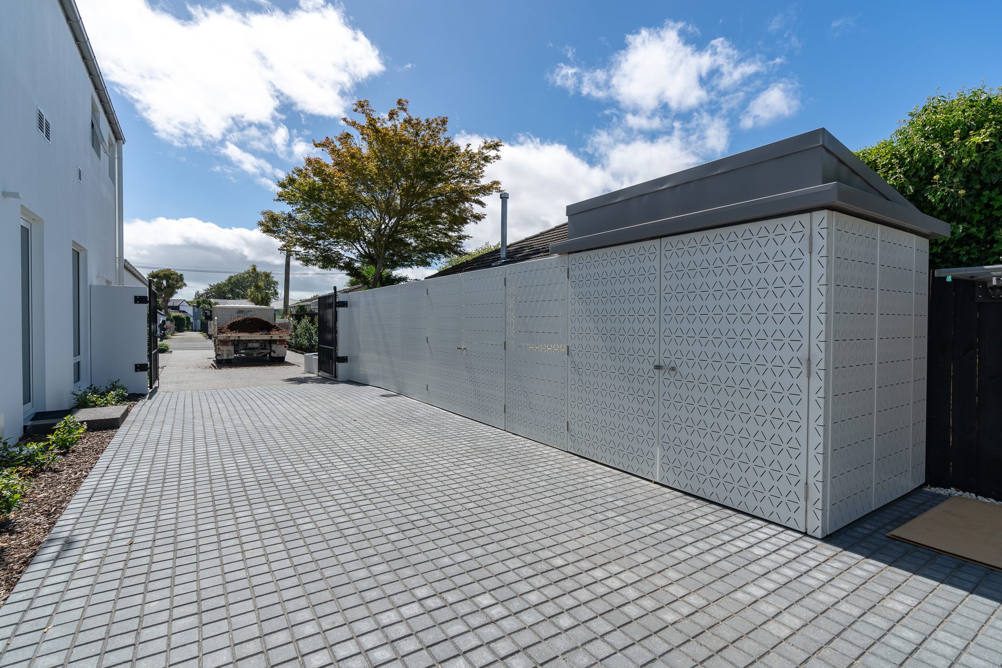 custom light grey aluminium architectural fence panels designed and installed at residential property by Axiom Built in Christchurch