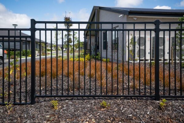 Black steel fencing for Bupa Retirement Village safety fencing in Prebbleton NZ, designed, manufactured and installed by Axiom