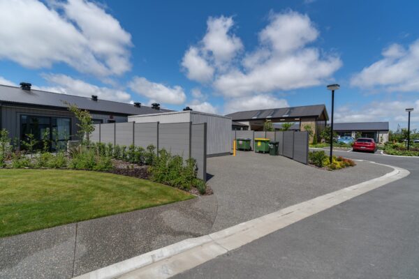 Street view of retirement fence panels made from steel and aluminium installed for Bupa Retirement Village in Prebbleton, designed, manufactured and installed by Axiom